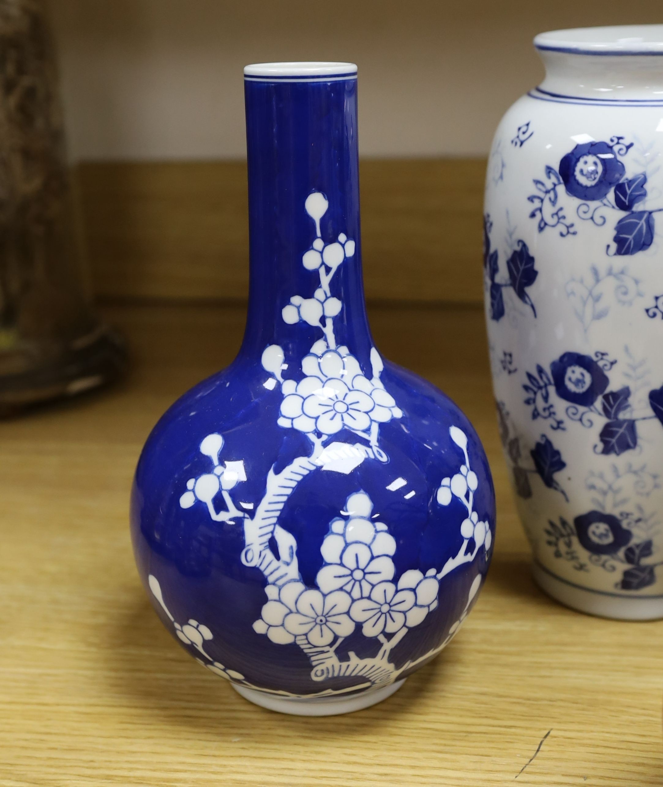 A group of Chinese blue and white porcelain including an early 20th century vase, tallest 28cm